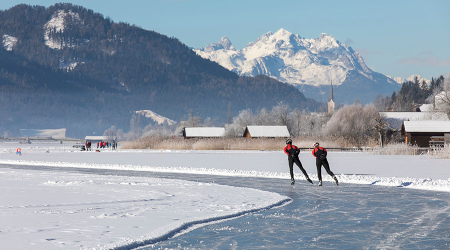 nawu_apartments_Winter_Eislaufen_Presseggersee nawu_apartments